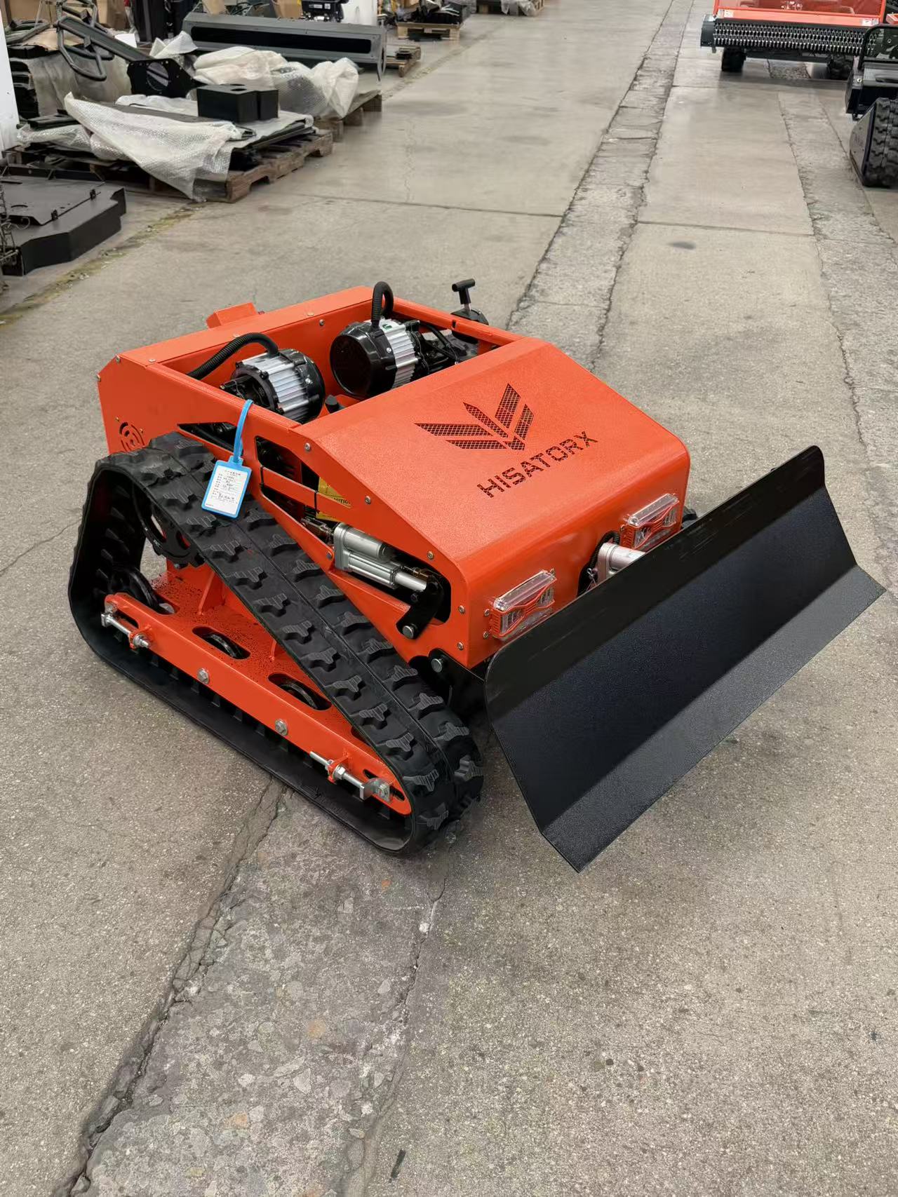HISATORX orange 550 mower with front blade in the factory